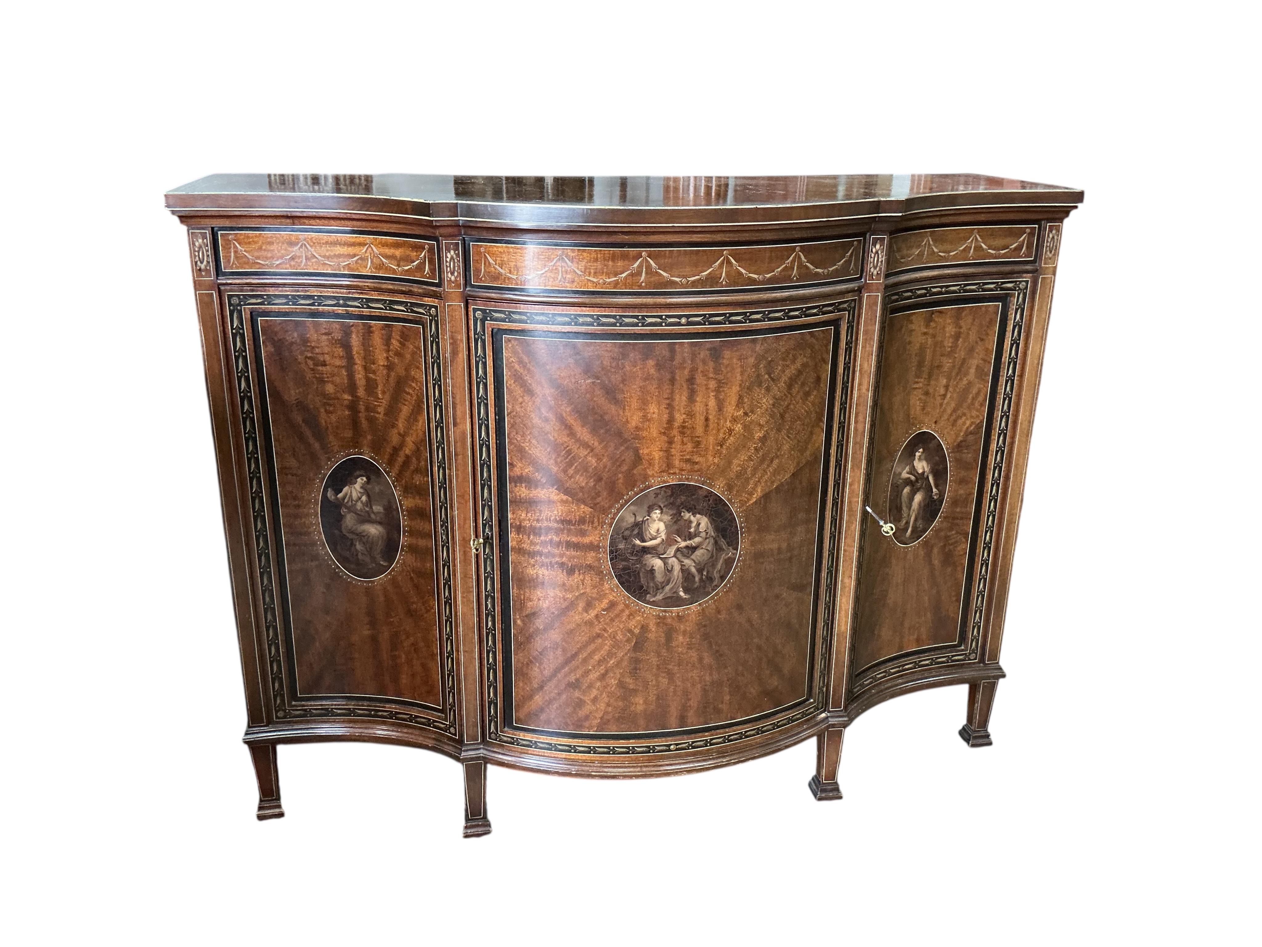 An Edwardian Sheraton Revival painted mahogany bowfront side cabinet